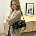 Rivet studded shoulder bag